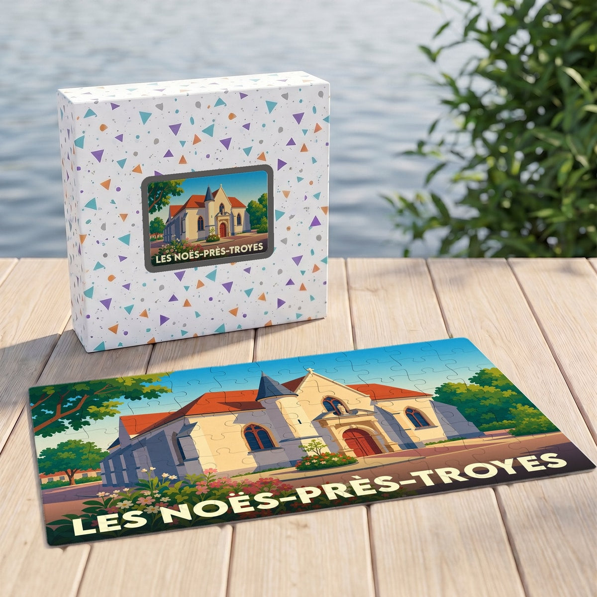 Puzzle souvenir de la ville de Les Noës-près-Troyes avec une illustration stylisée de son église.