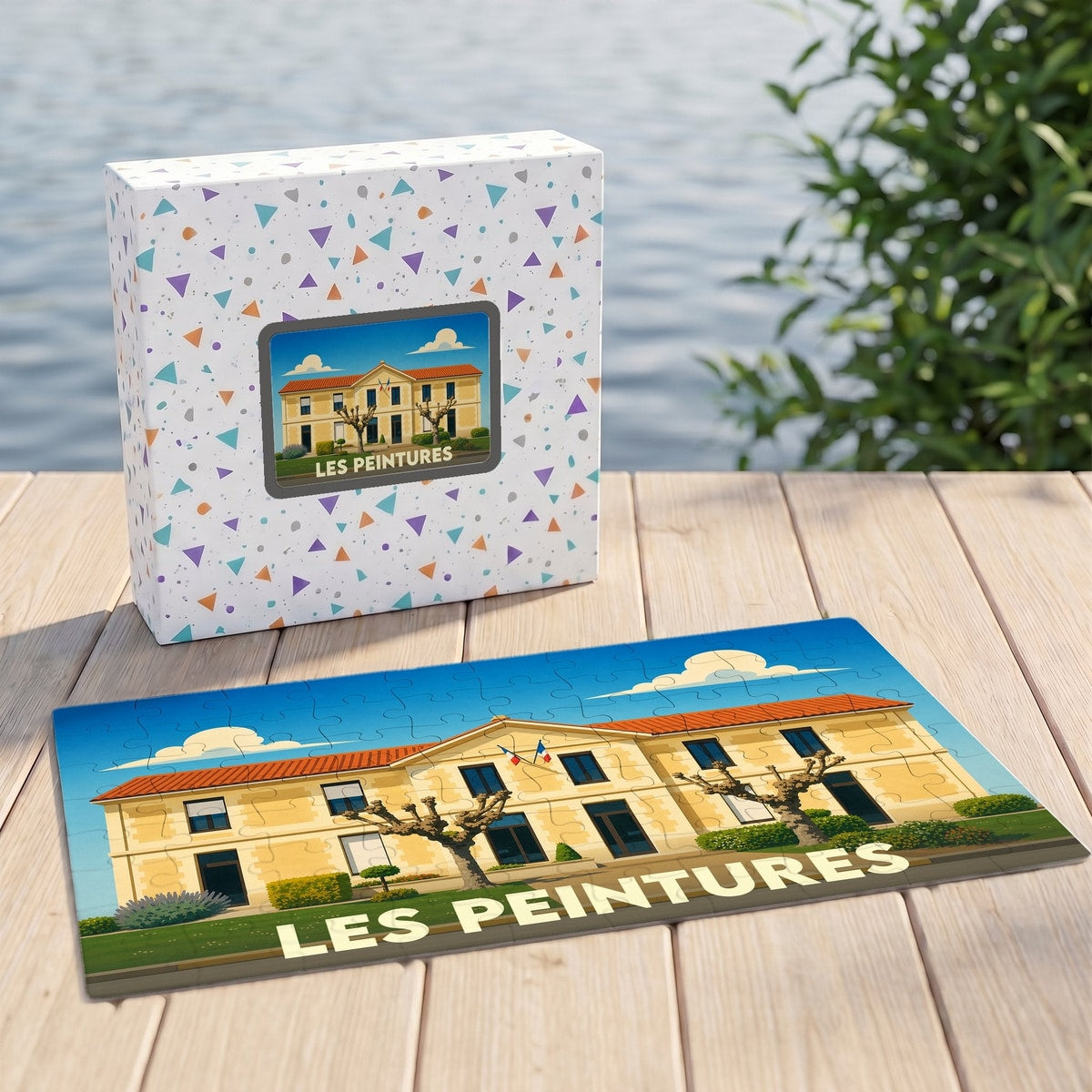 Puzzle souvenir de la ville de Les Peintures illustrant sa mairie dans un style graphique épuré.