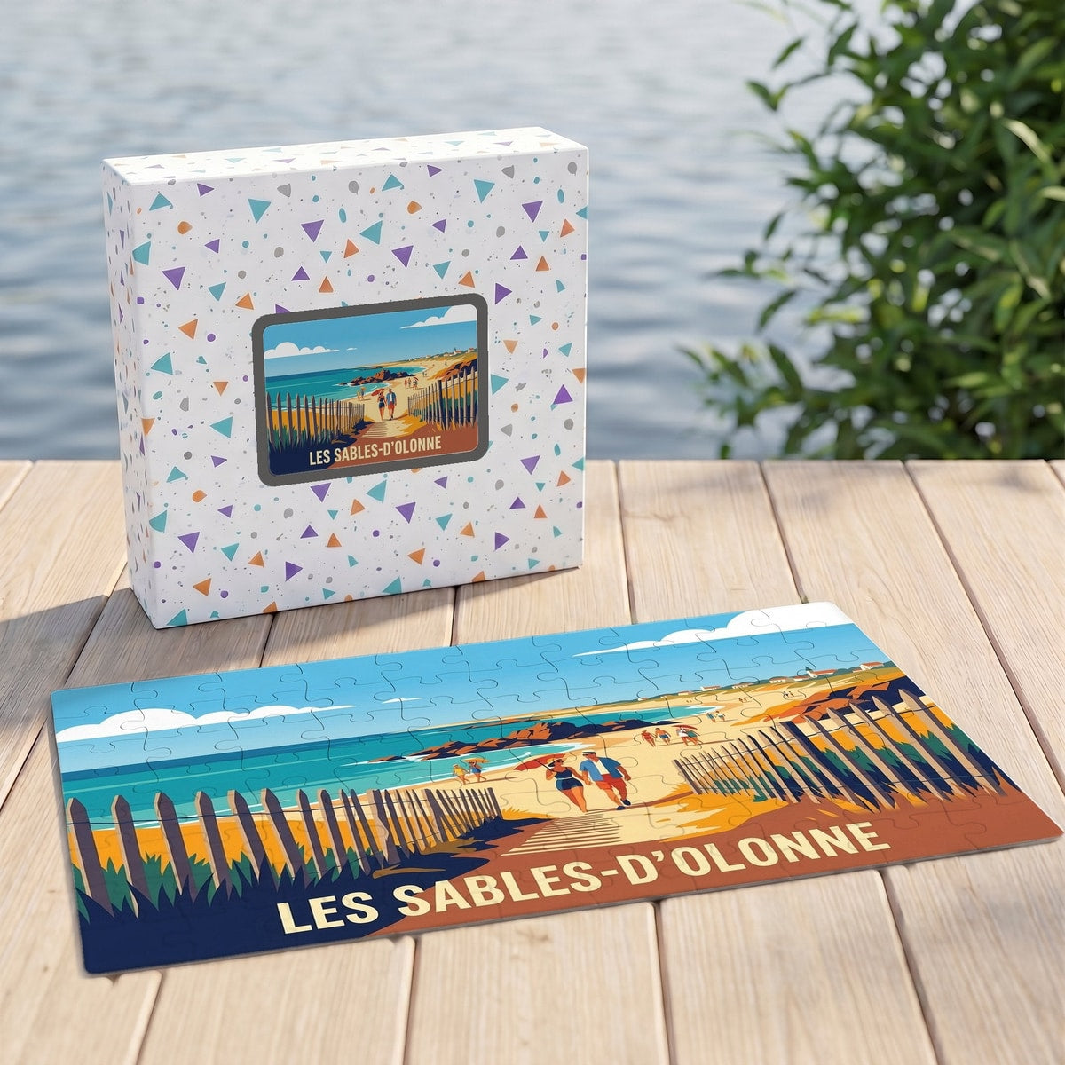 Puzzle souvenir de la ville de Les Sables-d'Olonne avec une illustration balnéaire stylisée.