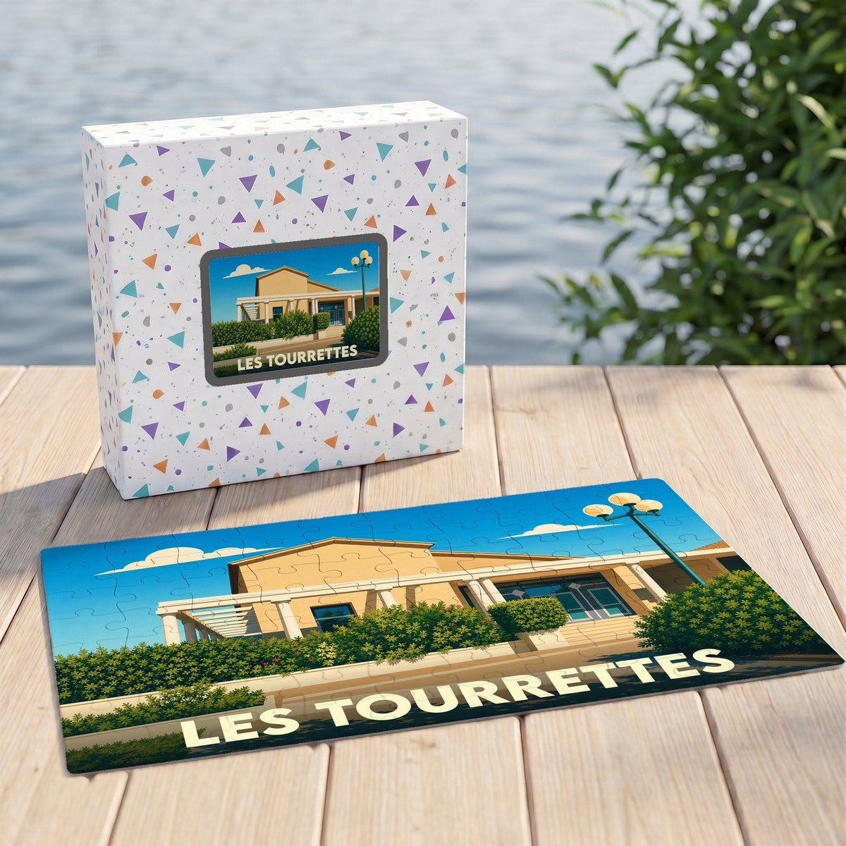Puzzle souvenir de la ville de Les Tourrettes avec une illustration stylisée.