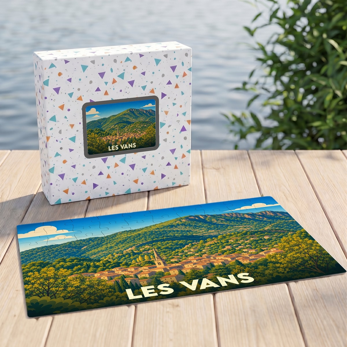 Puzzle souvenir de la ville de Les Vans avec une illustration paysagère stylisée.