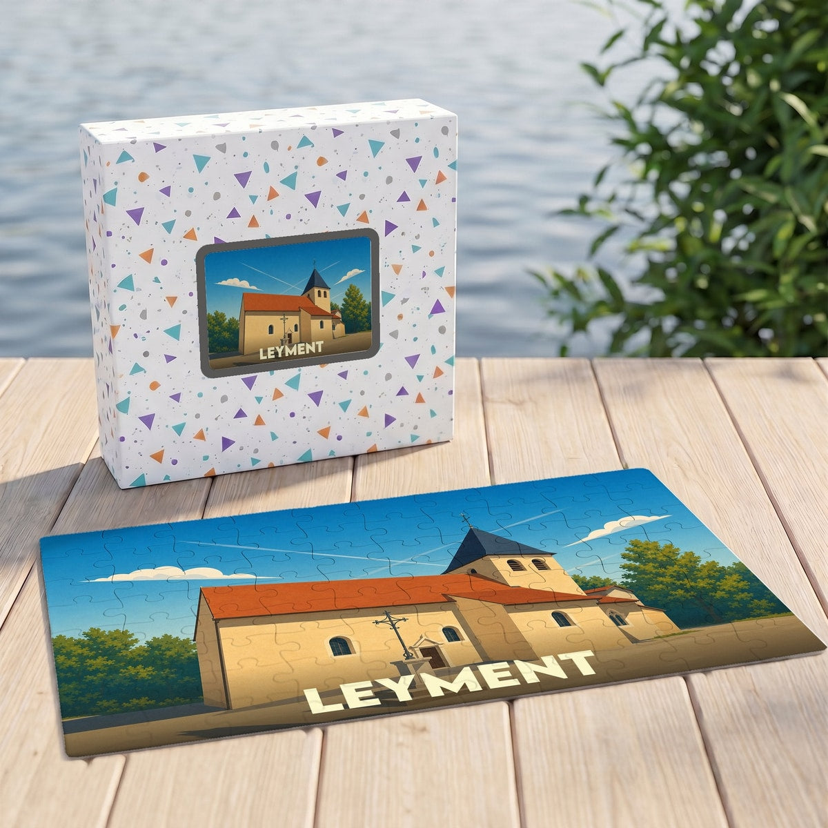 Puzzle souvenir de la ville de Leyment représentant une église sous un ciel bleu avec une illustration stylisée.