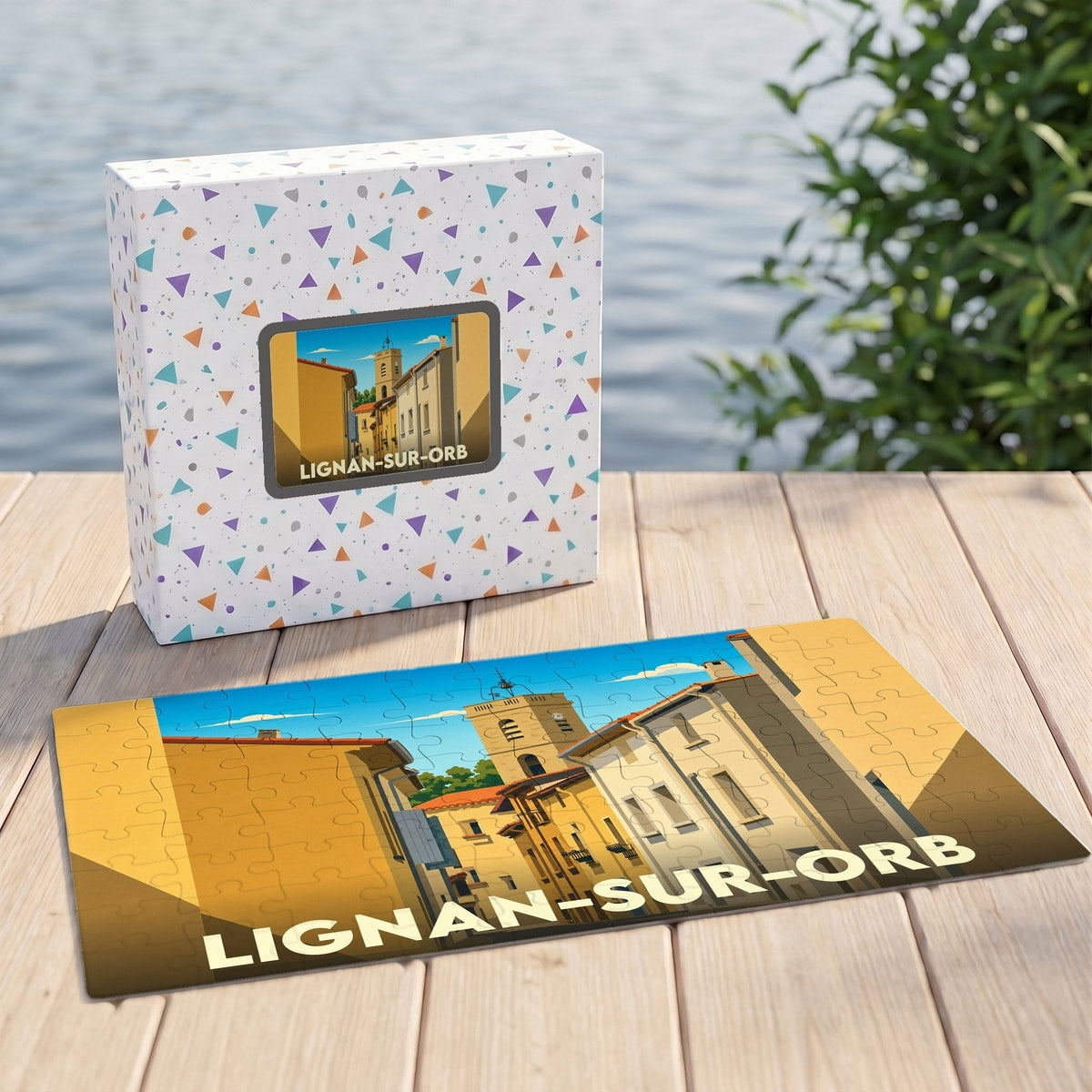 Puzzle souvenir de la ville de Lignan-sur-Orb avec une illustration stylisée d'une rue ensoleillée.