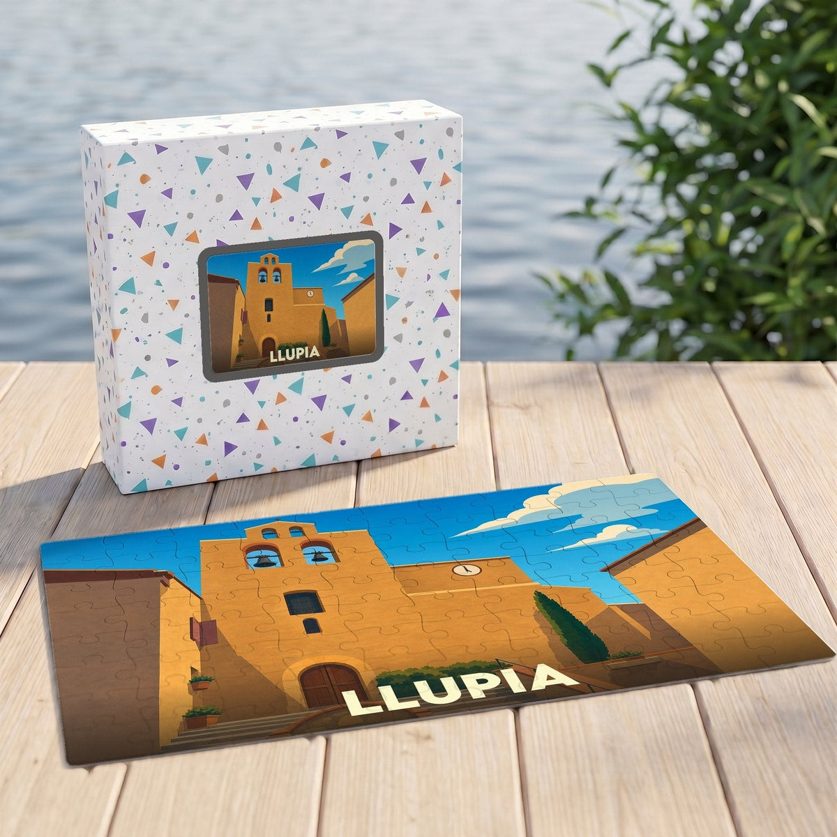 Puzzle souvenir de la ville de Llupia avec une illustration stylisée d'une église sous un ciel bleu.