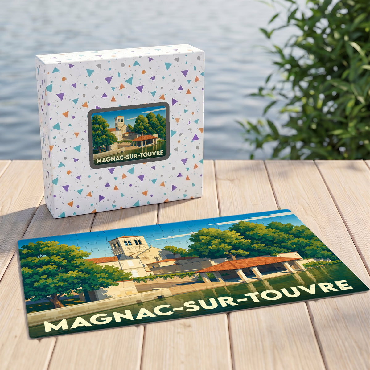 Puzzle souvenir de Magnac-sur-Touvre avec une illustration stylisée et colorée de la ville au bord de l'eau.