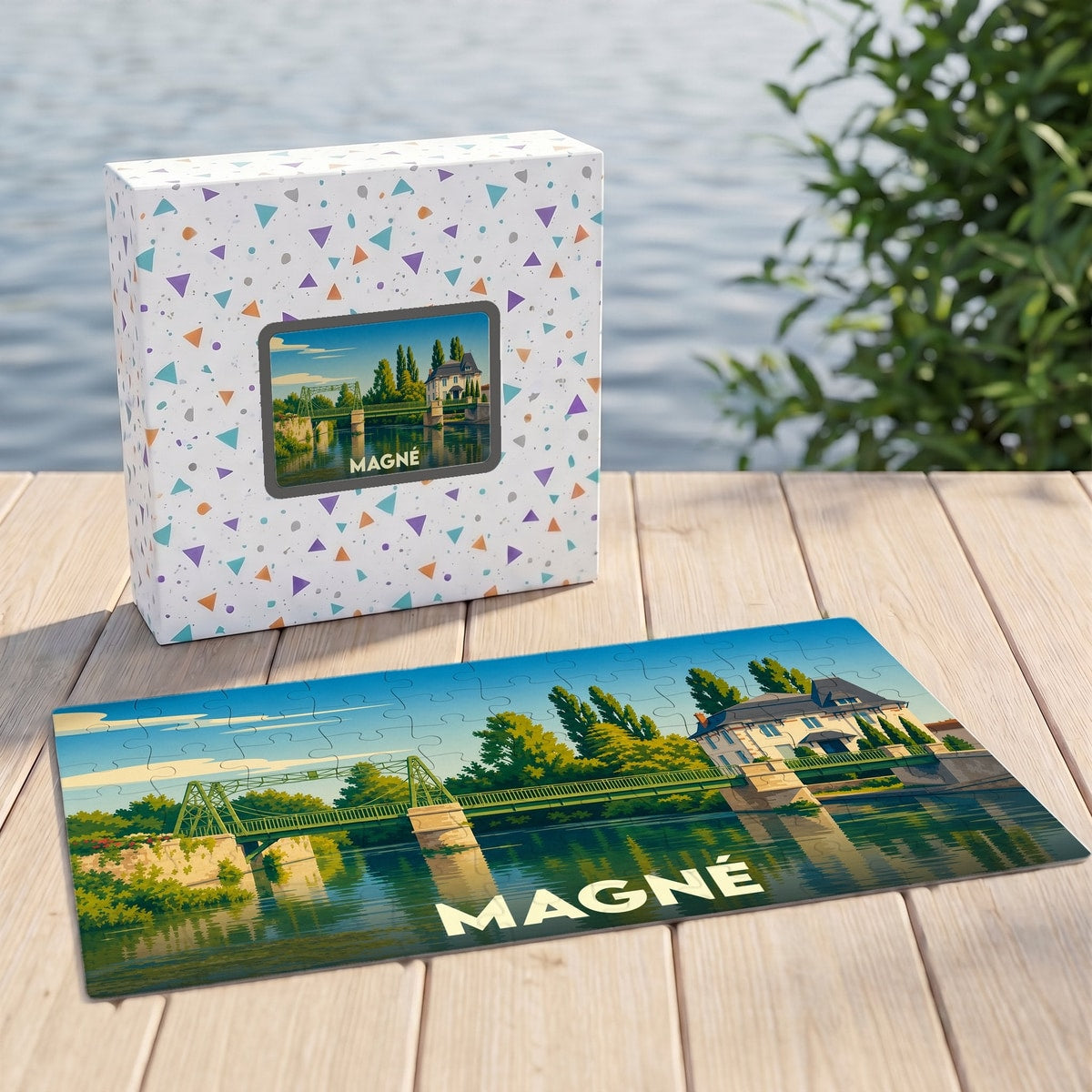 Puzzle souvenir de la ville de Magné avec une illustration stylisée d'un pont et d'une maison au bord de l'eau.