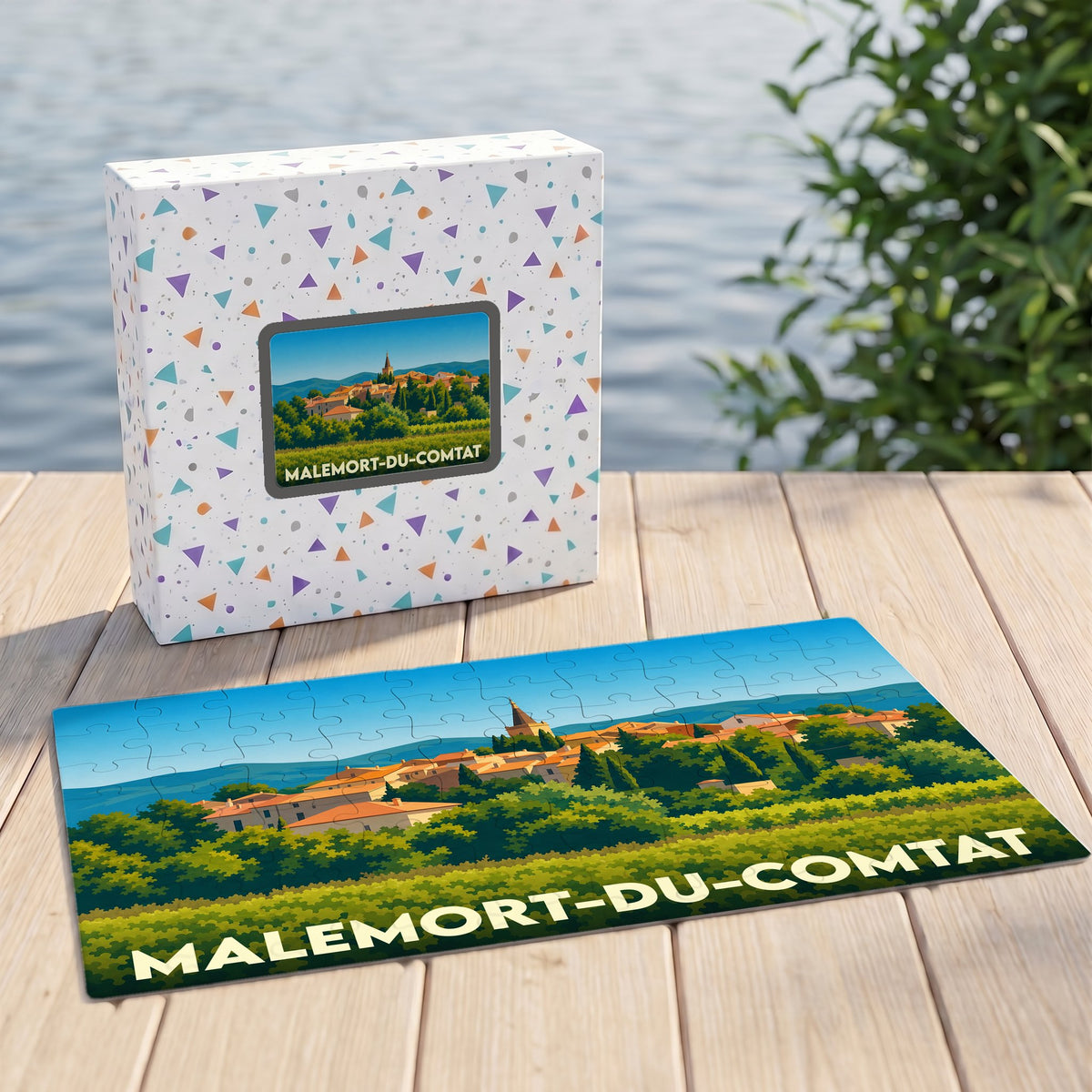 Puzzle souvenir de la ville de Malemort-du-Comtat avec une illustration panoramique stylisée.