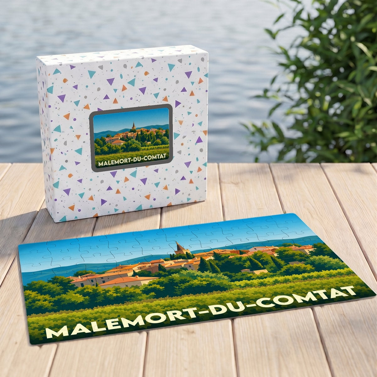 Puzzle souvenir de la ville de Malemort-du-Comtat avec une illustration panoramique stylisée.