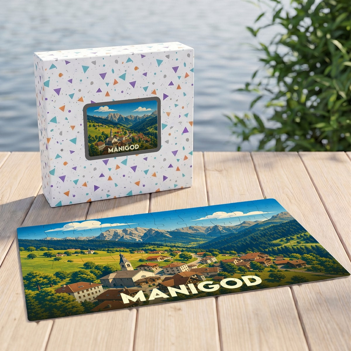 Puzzle souvenir de la ville de Manigod représentant un paysage alpin illustré dans sa boîte assortie.
