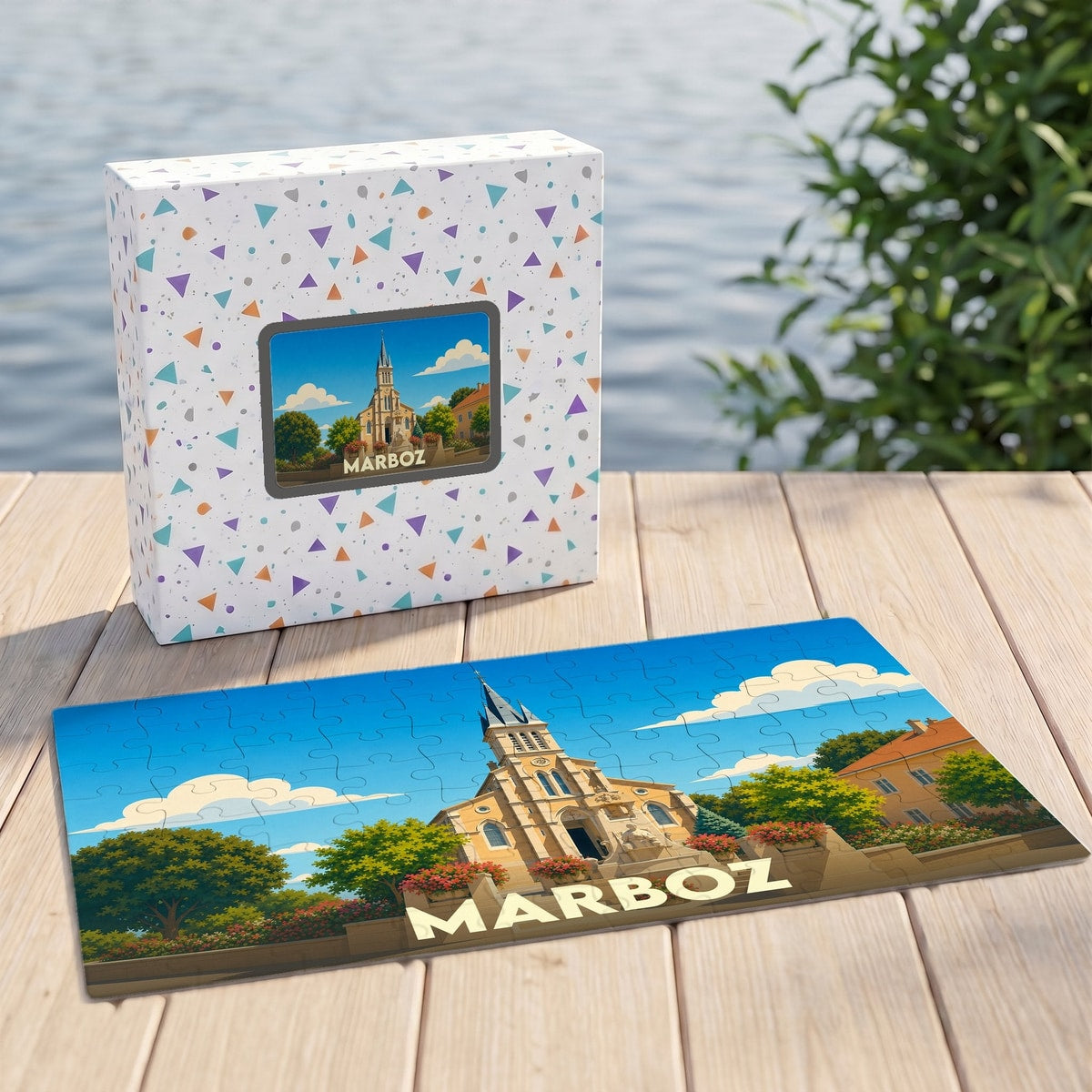 Puzzle souvenir de la ville de Marboz avec une illustration stylisée d'une église sous un ciel bleu.