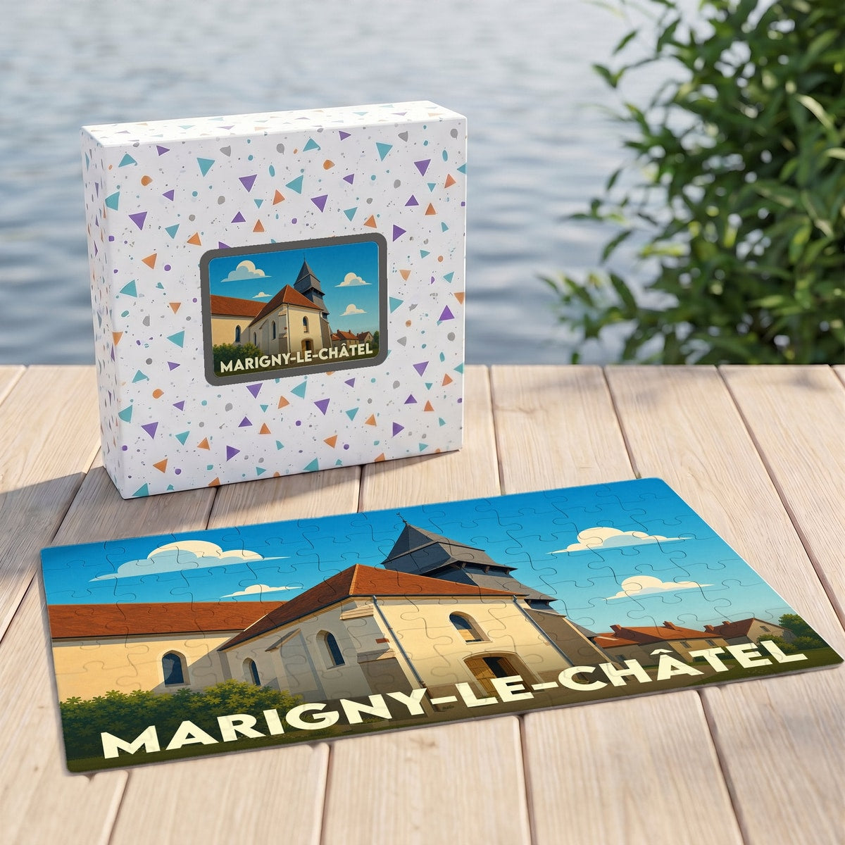Puzzle souvenir de la ville de Marigny-le-Châtel avec son illustration stylisée et sa boîte assortie.