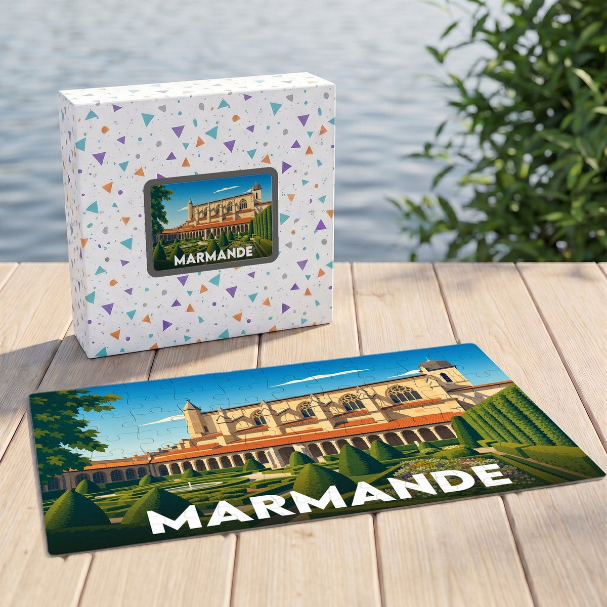 Puzzle souvenir de la ville de Marmande avec une illustration stylisée de son église et de ses jardins.