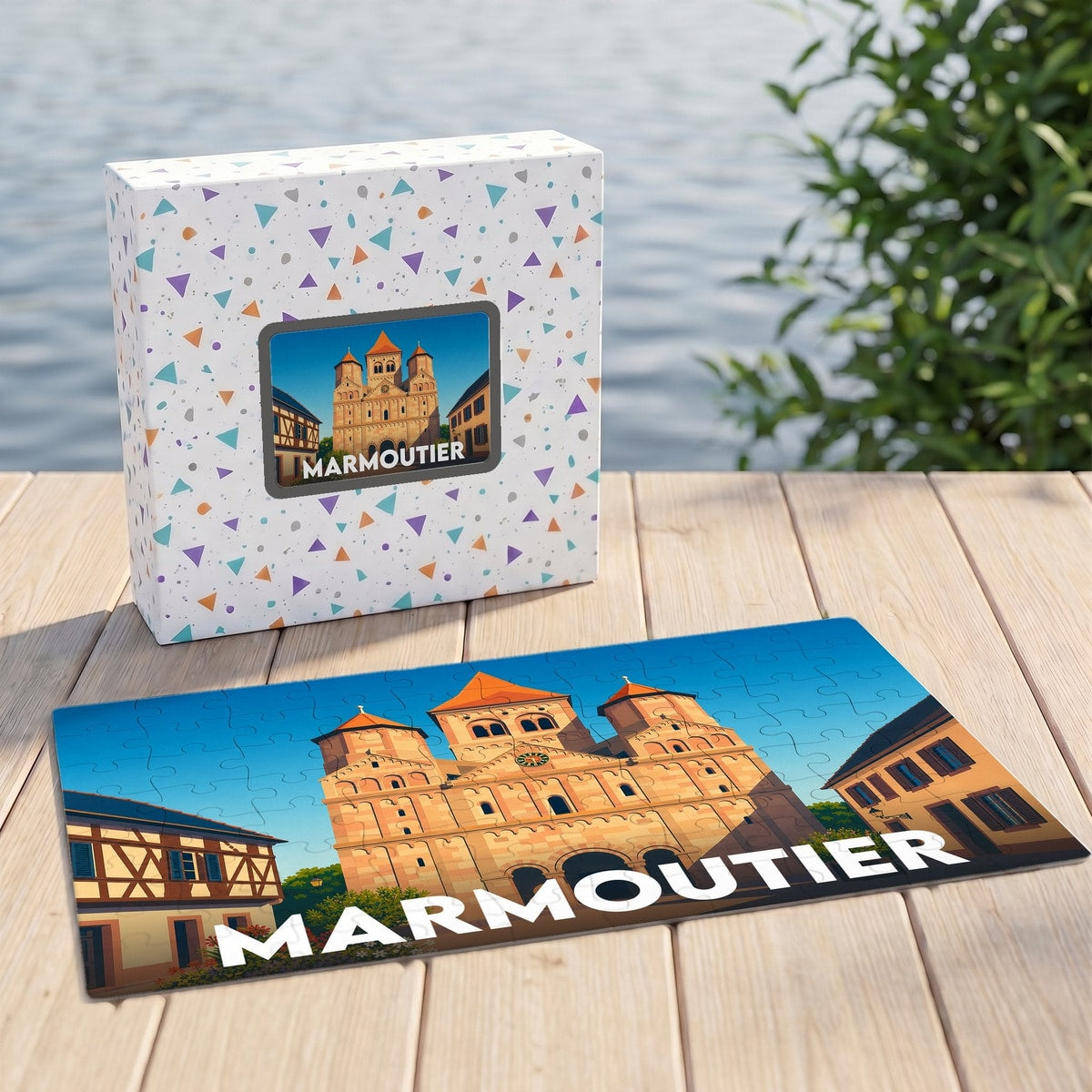 Puzzle souvenir de la ville de Marmoutier avec une illustration stylisée de son église abbatiale.