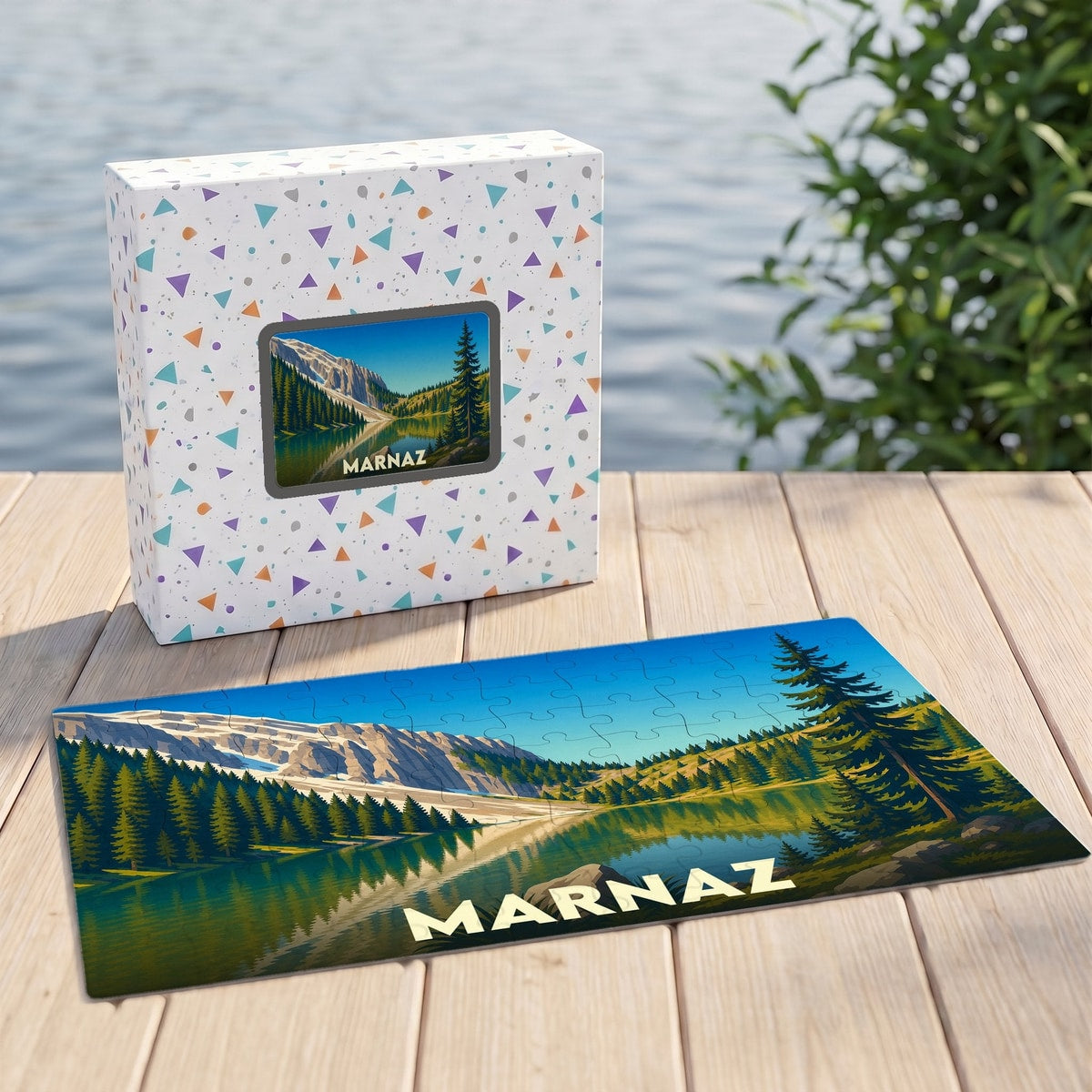 Puzzle souvenir de la ville de Marnaz avec une illustration stylisée d'un paysage de montagne et de lac.