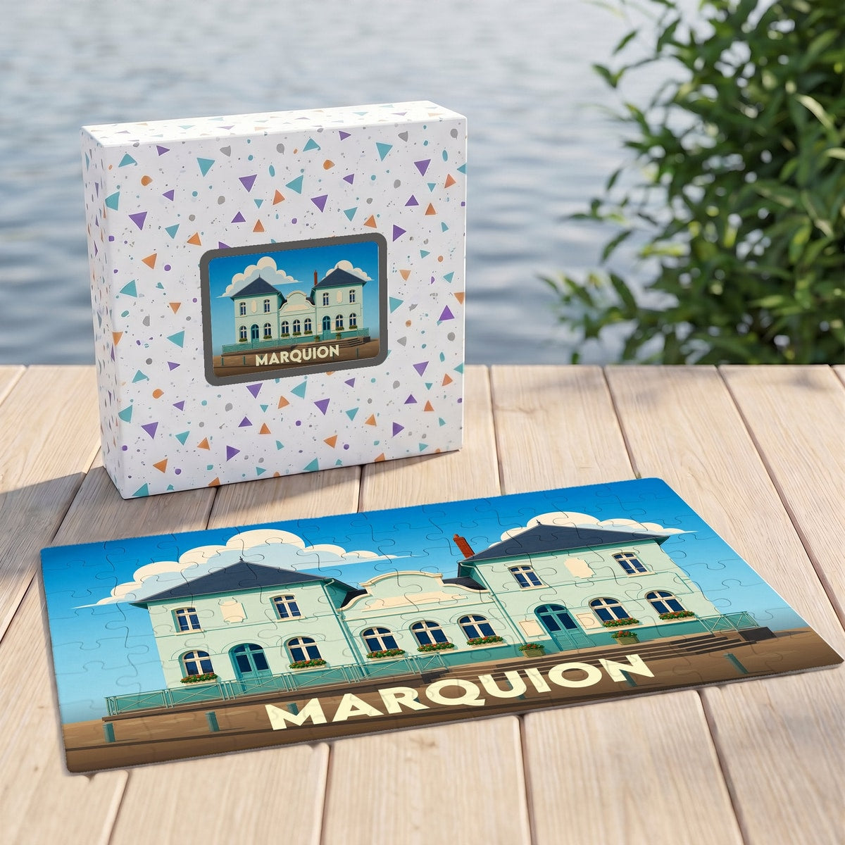 Puzzle souvenir de la ville de Marquion représentant une illustration stylisée de son architecture sur sa boîte et ses pièces.