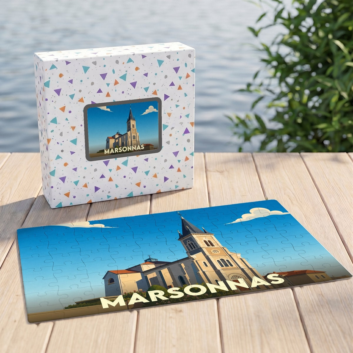 Puzzle souvenir de la ville de Marsonnas avec une illustration stylisée d'une église sous un ciel bleu.
