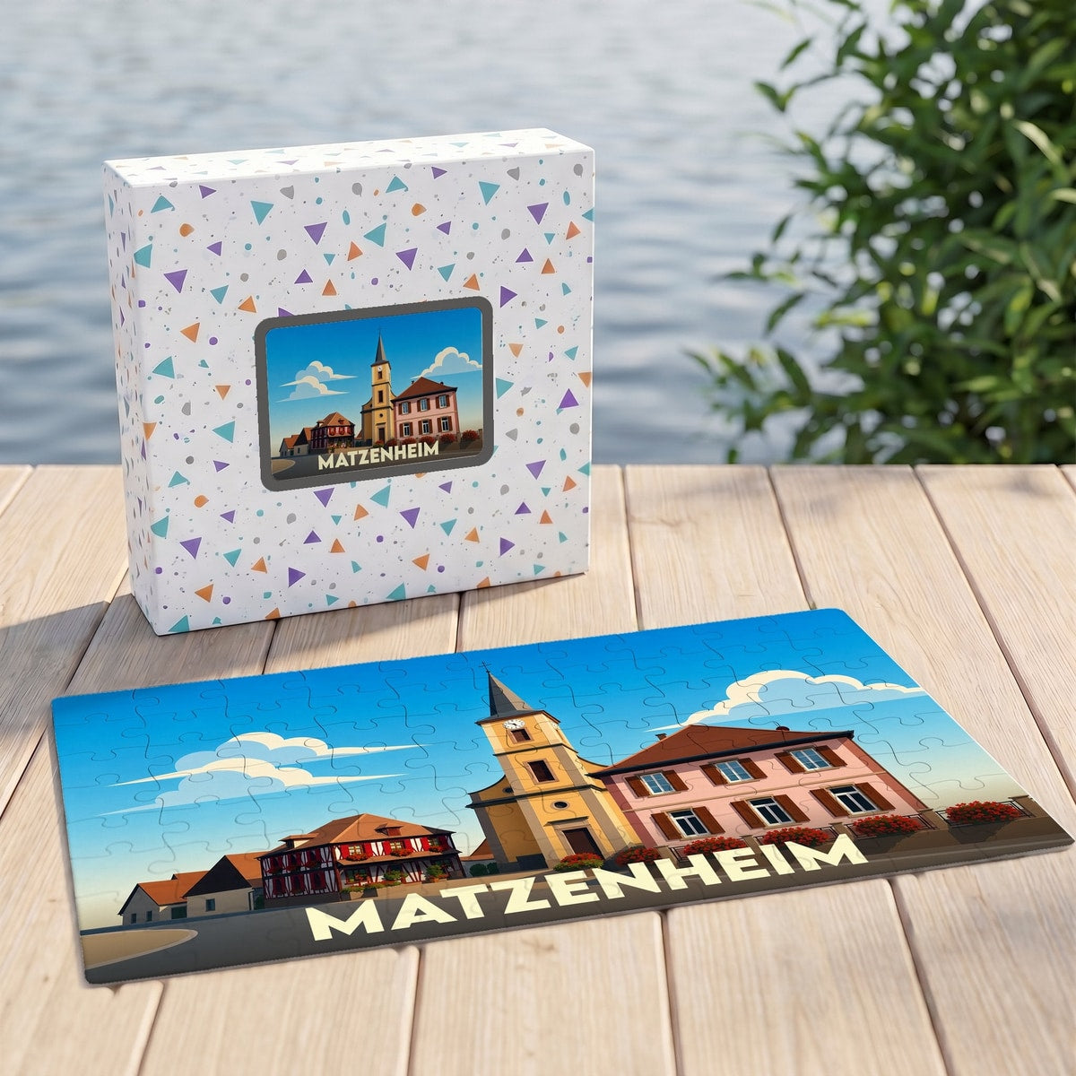 Puzzle souvenir de la ville de Matzenheim avec une illustration stylisée et sa boîte assortie.