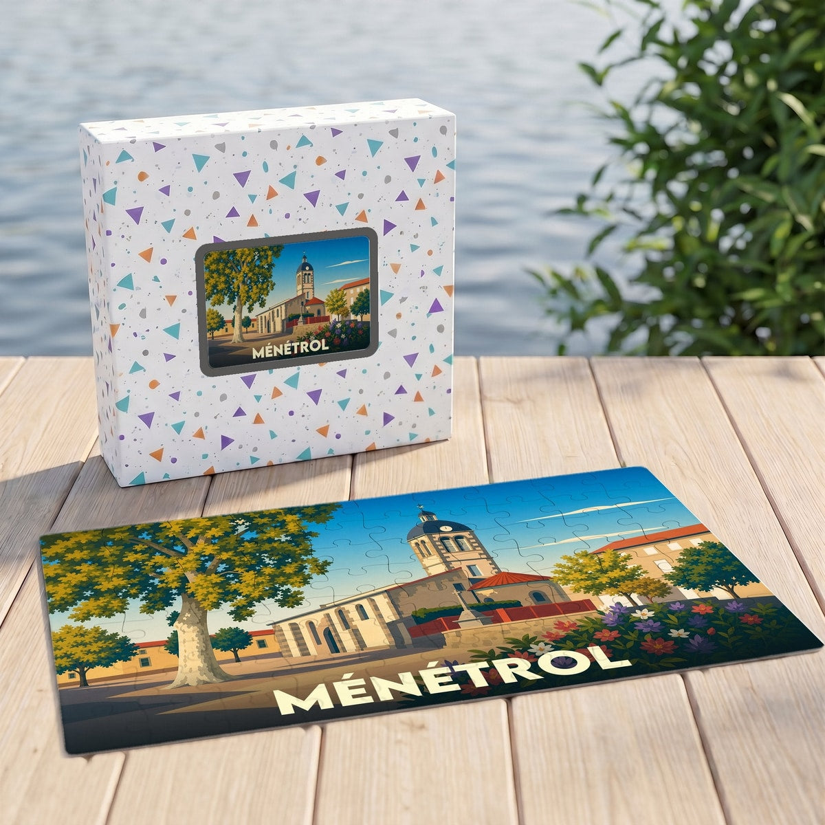 Puzzle souvenir de la ville de Ménétrol avec une illustration stylisée.