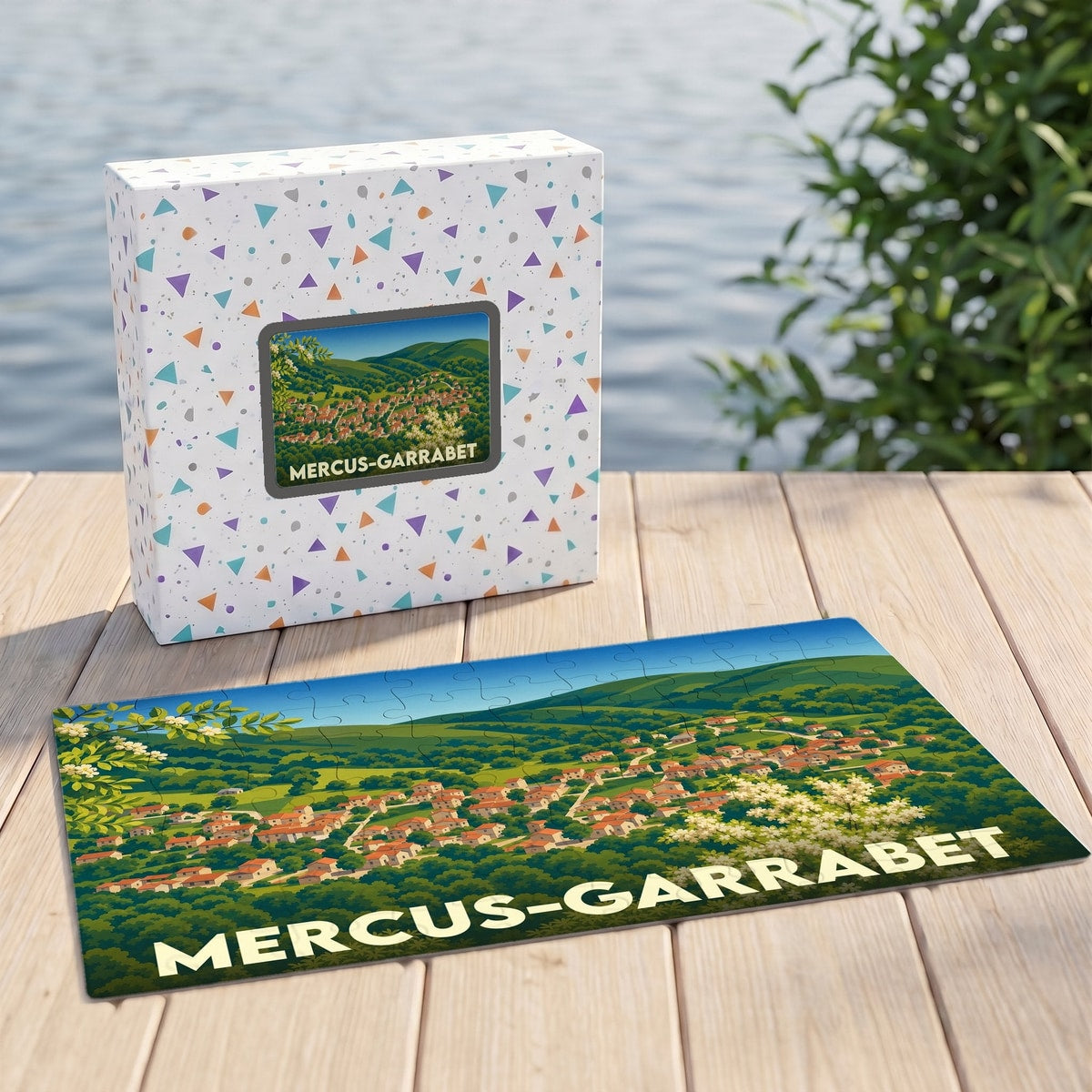 Puzzle souvenir de la commune de Mercus-Garrabet présentant une illustration de son paysage urbain et vallonné.