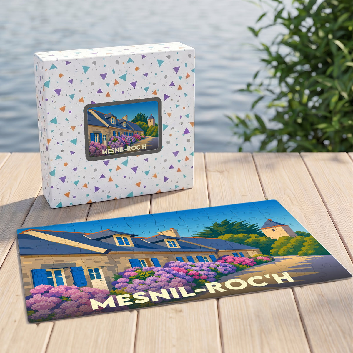 Puzzle souvenir de la ville de Mesnil-Roc'h avec une illustration stylisée de maisons fleuries.