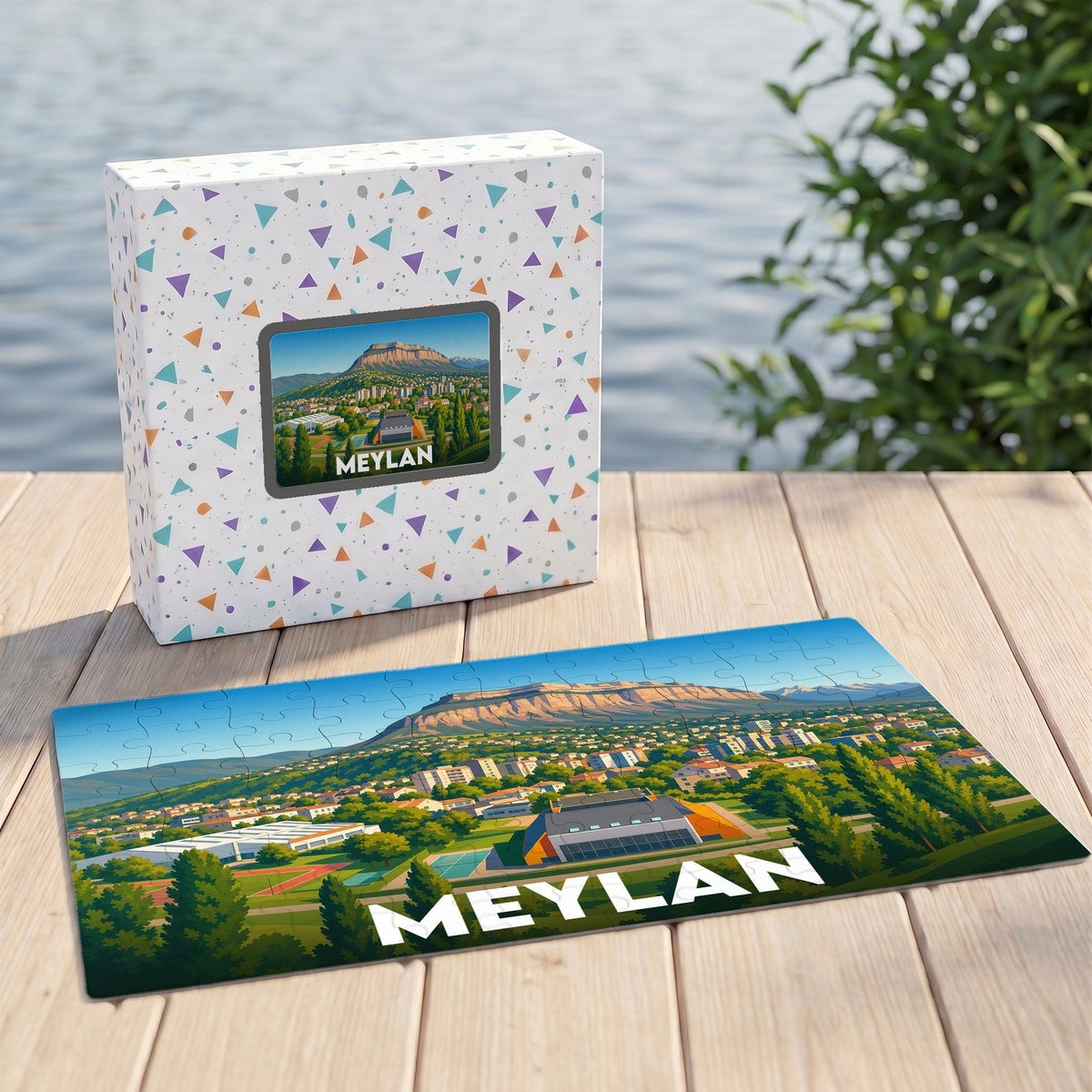 Puzzle souvenir de la ville de Meylan avec une illustration stylisée représentant un paysage de montagne.