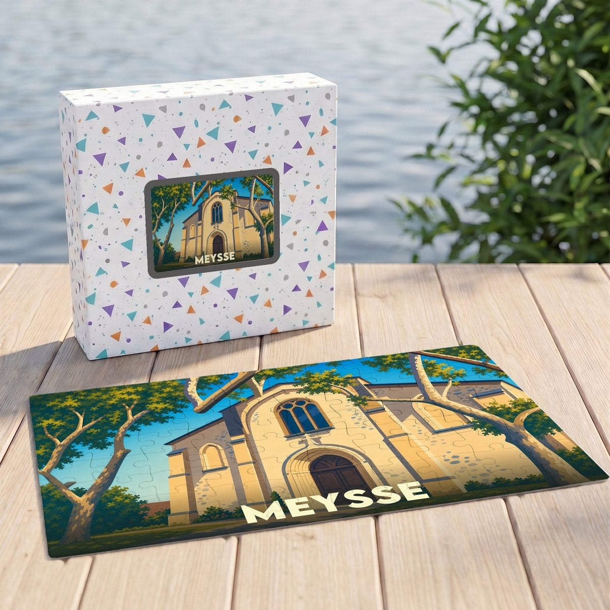Puzzle souvenir de la ville de Meysse avec une illustration stylisée de son église et de son environnement.