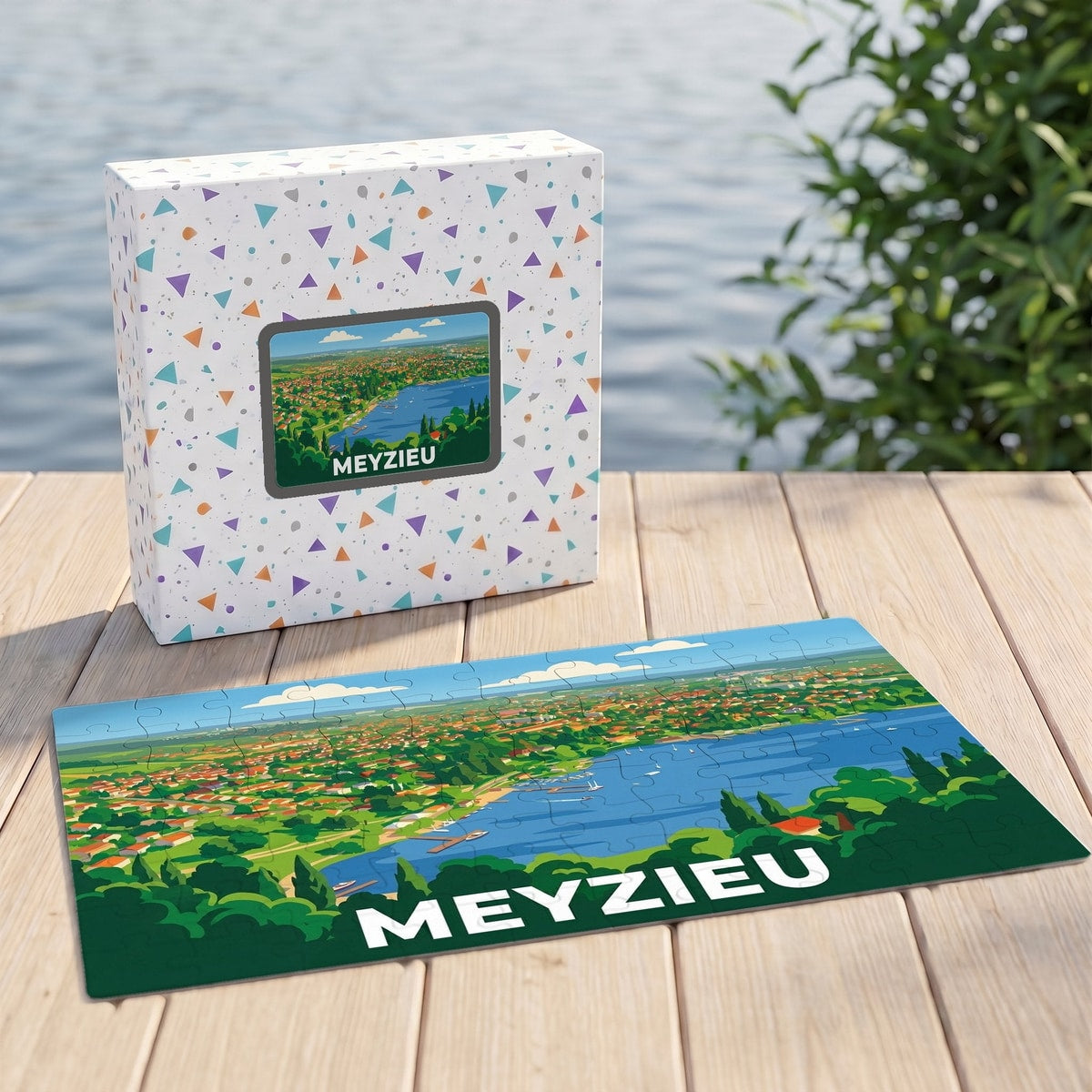 Puzzle souvenir de la ville de Meyzieu représentant une vue aérienne illustrée du lac et des habitations.