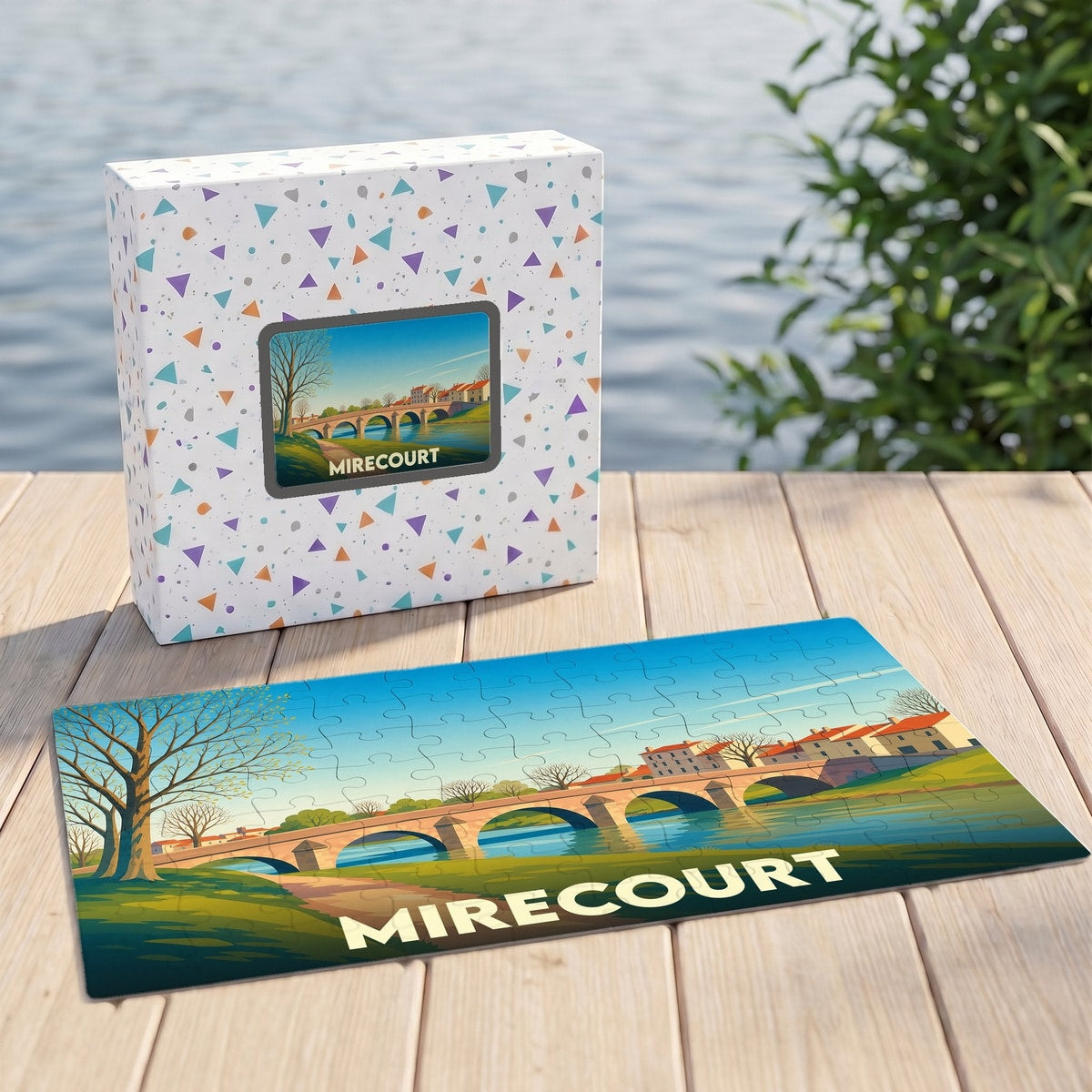Puzzle souvenir de la ville de Mirecourt illustrant un pont historique sous un ciel bleu dégagé.
