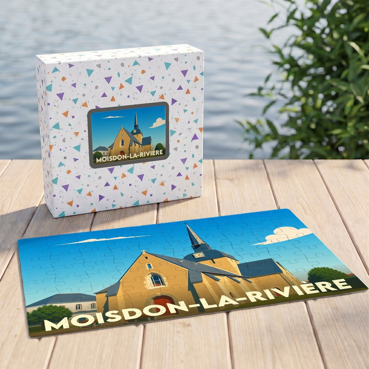 Puzzle souvenir de la ville de Moisdon-la-Rivière avec une illustration stylisée de son église.