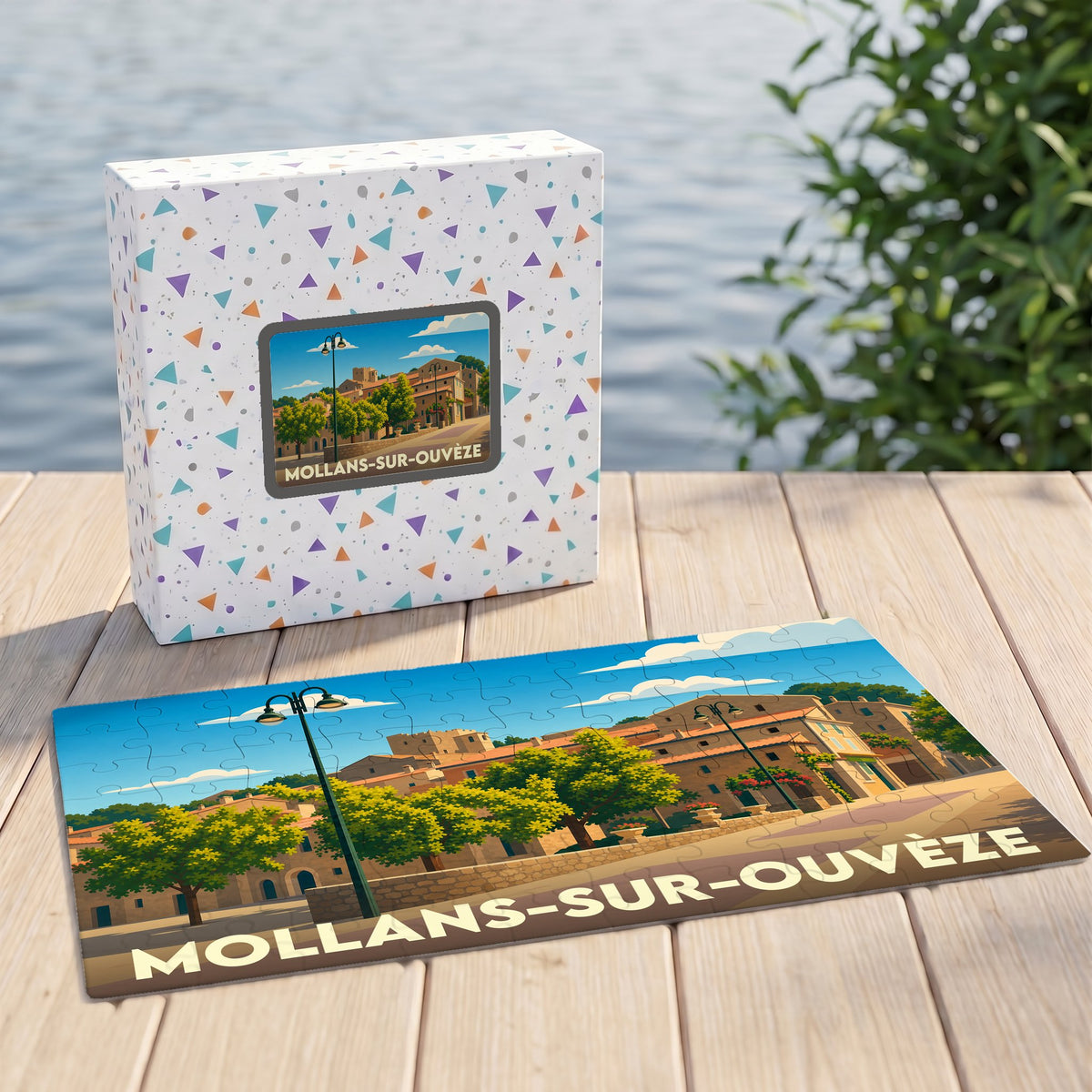 Puzzle souvenir de la ville de Mollans-sur-Ouvèze avec une illustration stylisée et sa boîte assortie.