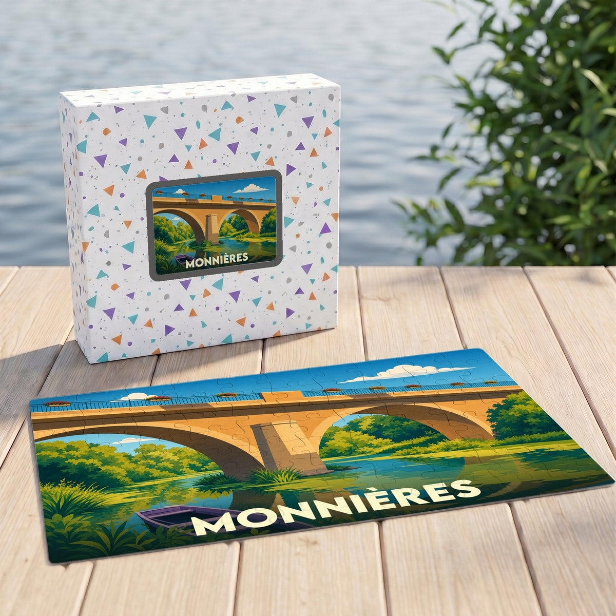 Puzzle souvenir de la ville de Monnières avec une illustration colorée représentant un pont au bord de l'eau.