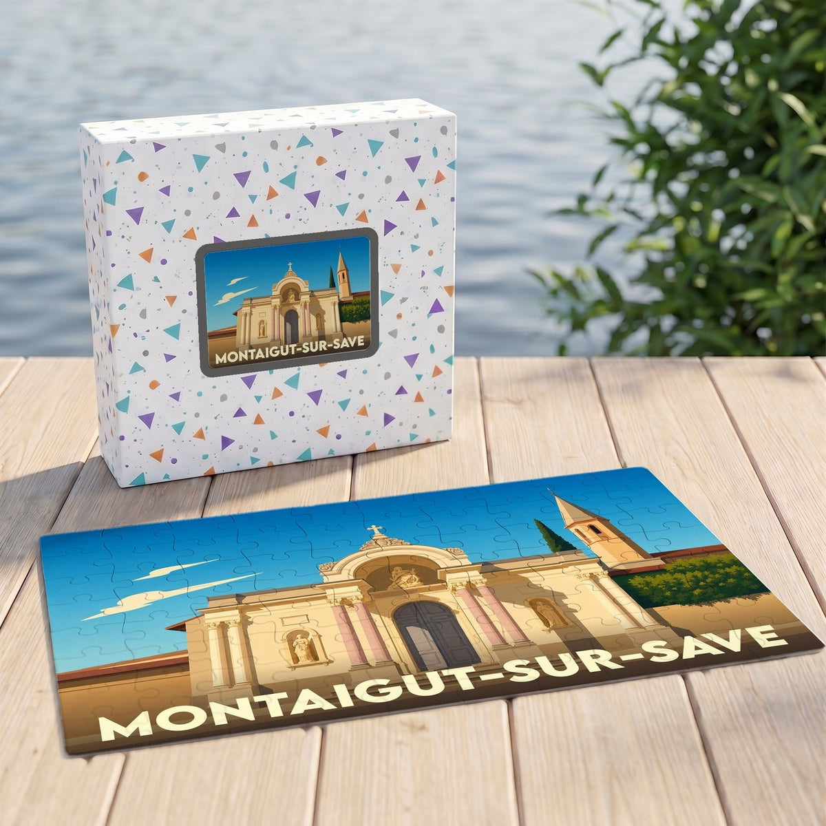 Puzzle souvenir de la ville de Montaigut-sur-Save avec une illustration stylisée de son patrimoine architectural.
