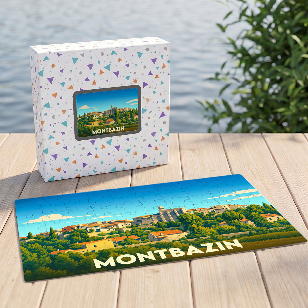 Puzzle souvenir de la ville de Montbazin avec une illustration stylisée et colorée du village.