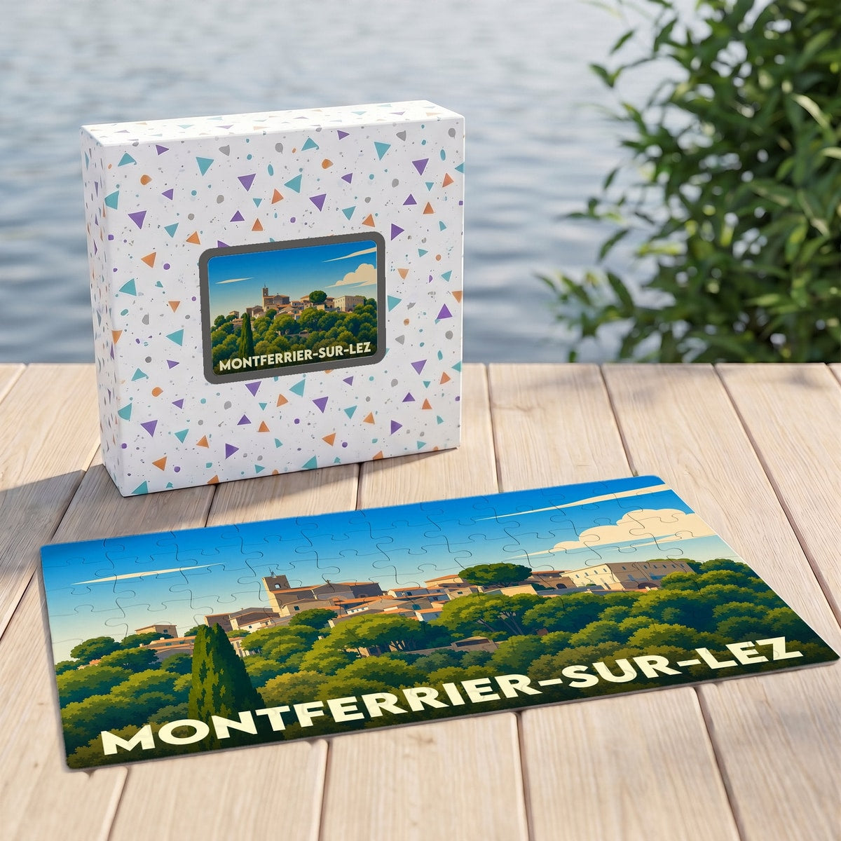 Puzzle souvenir de la ville de Montferrier-sur-Lez avec une illustration panoramique stylisée.