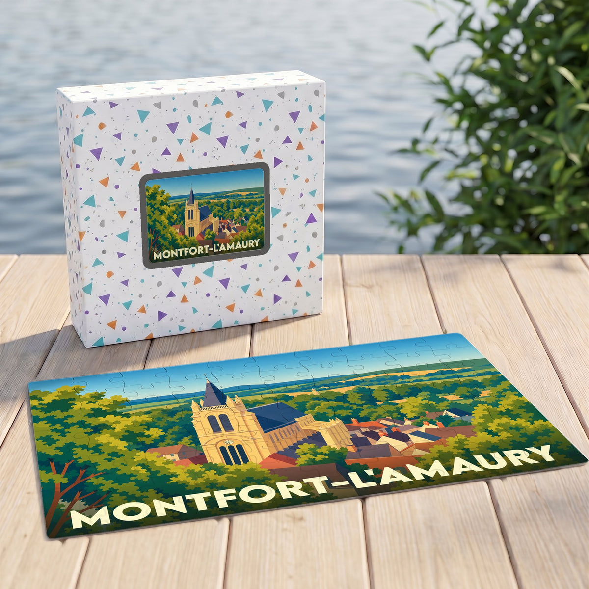 Puzzle souvenir de la ville de Montfort-l'Amaury avec une illustration stylisée et sa boîte assortie.