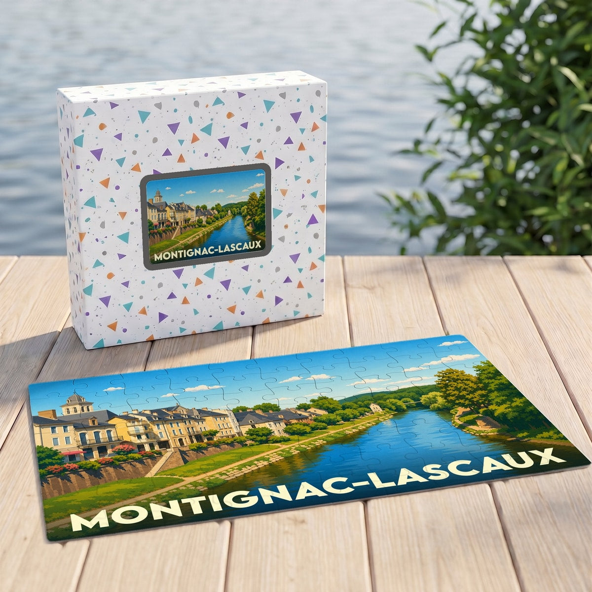 Puzzle souvenir de la ville de Montignac-Lascaux représentant un paysage fluvial illustré.