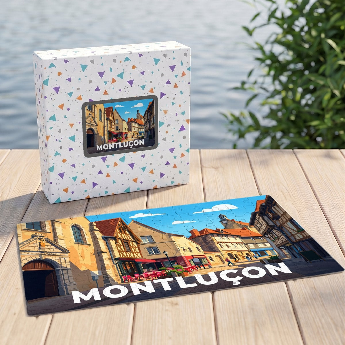 Puzzle souvenir de la ville de Montluçon avec une illustration stylisée de ses rues médiévales et de sa boîte assortie.