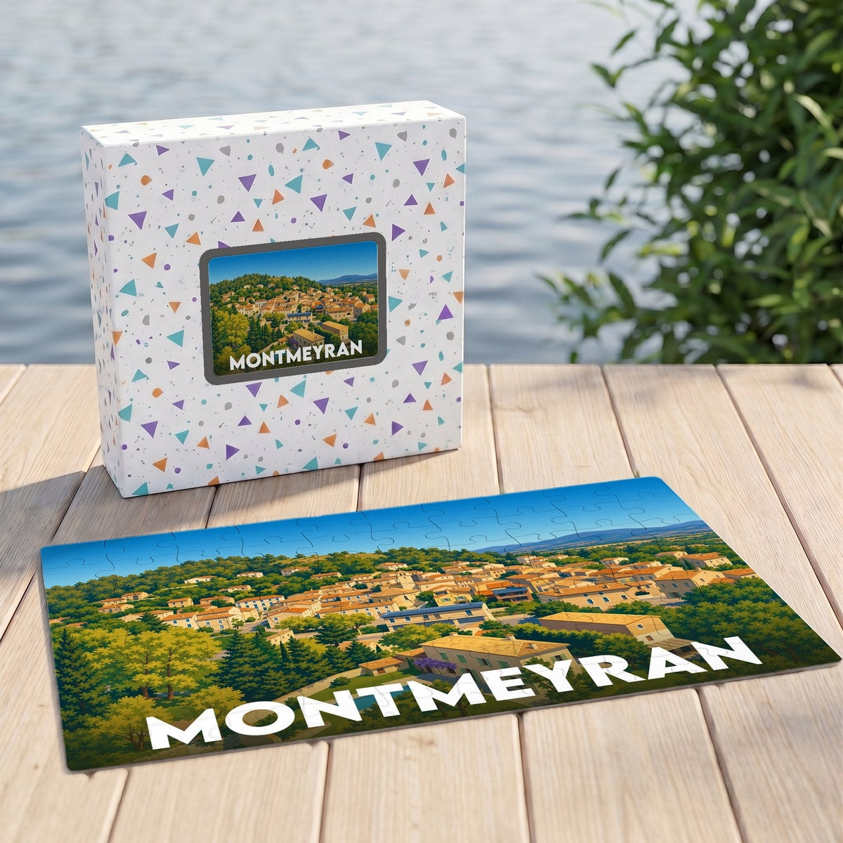 Puzzle souvenir de la ville de Montmeyran avec une illustration paysagère colorée.