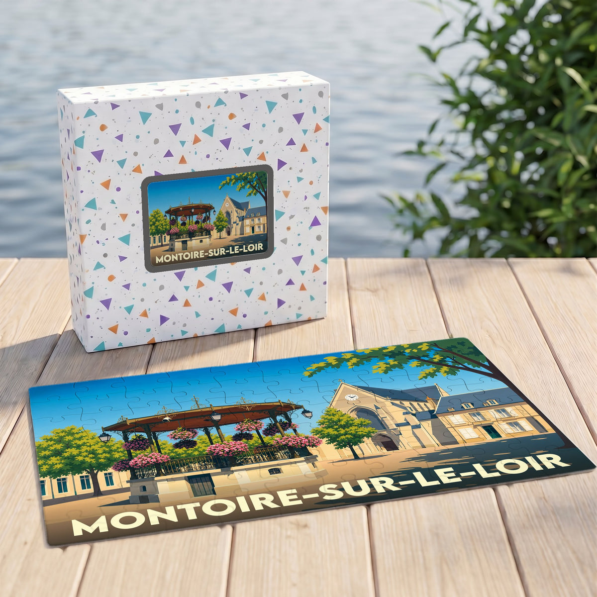 Puzzle souvenir de la ville de Montoire-sur-le-Loir avec une illustration stylisée d'un kiosque et de son église.