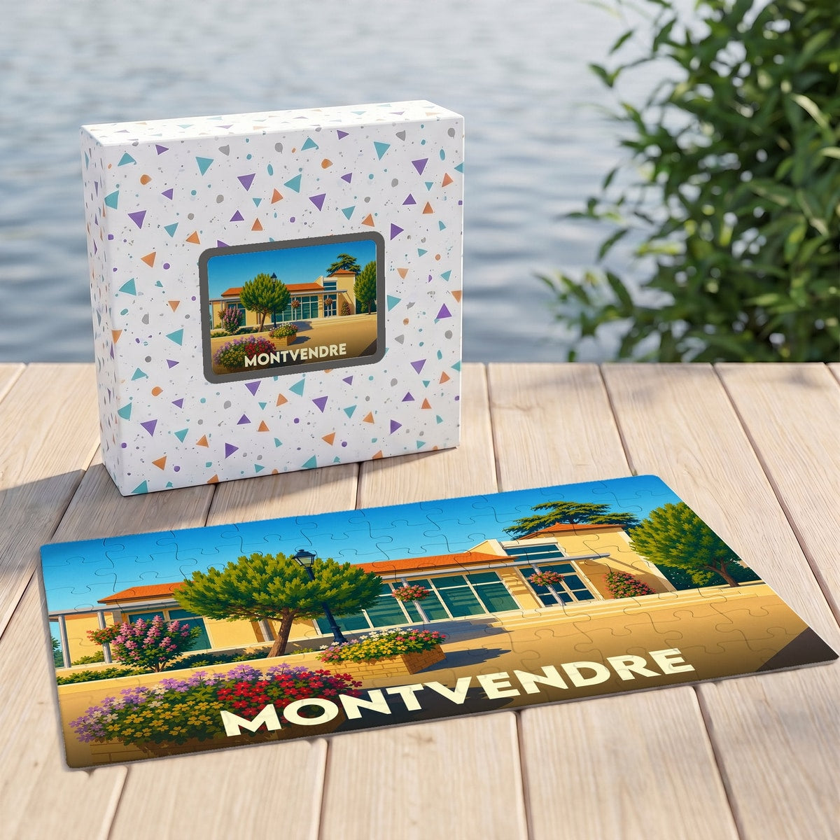 Puzzle souvenir de la ville de Montvendre avec une illustration colorée et son coffret assorti.