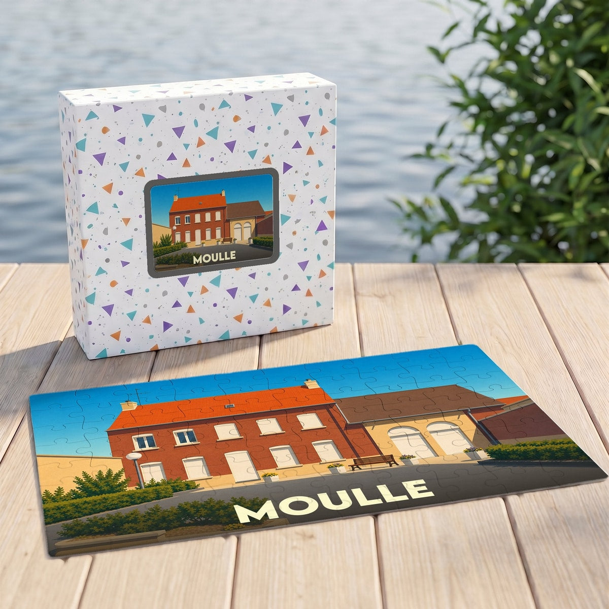 Puzzle souvenir de la ville de Moulle avec une illustration stylisée d'une maison en briques.