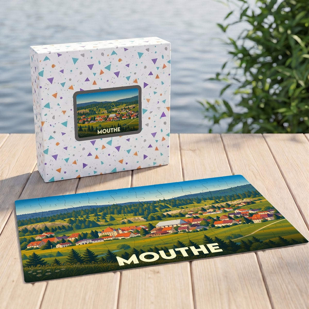Puzzle souvenir de la ville de Mouthe avec une illustration de paysage champêtre.