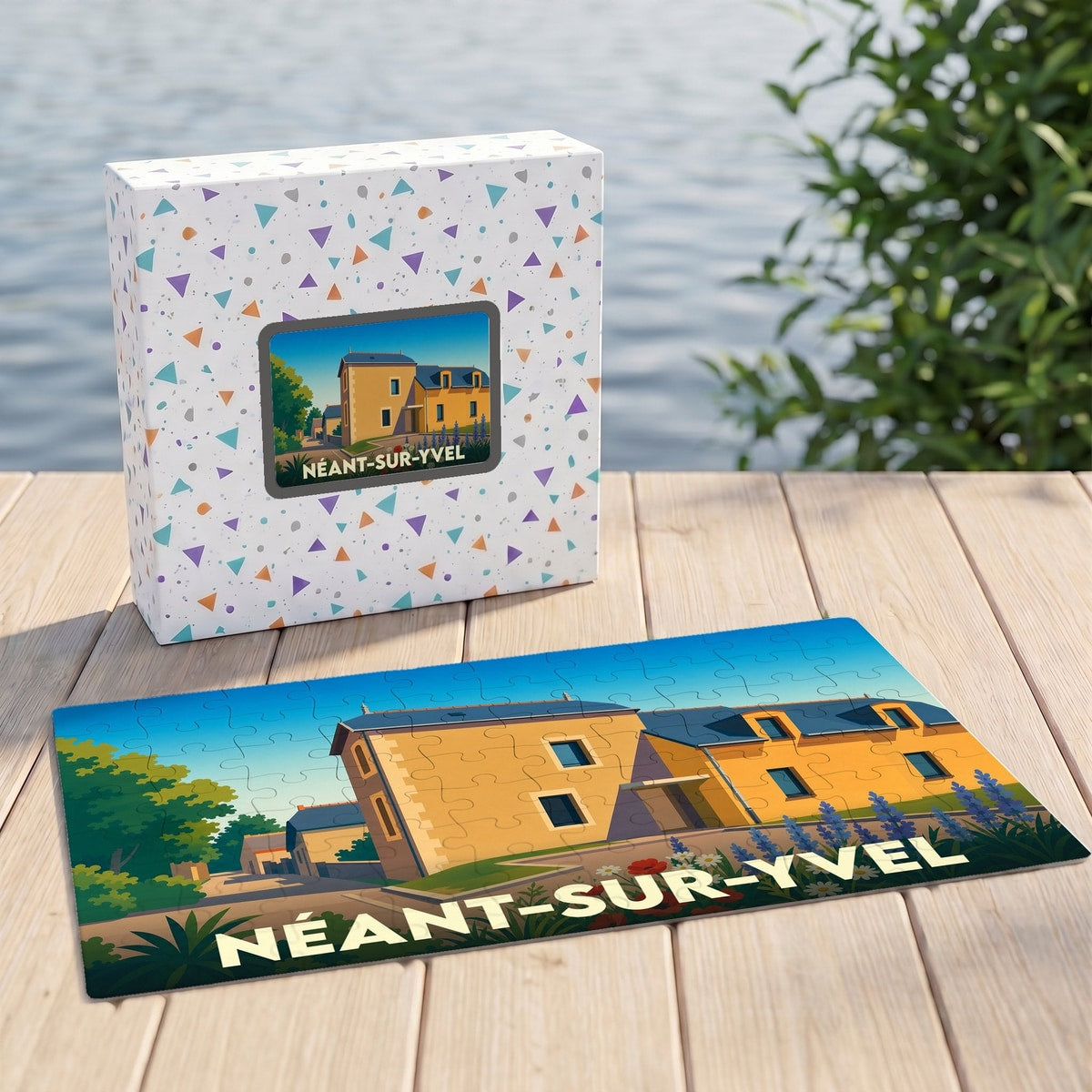 Puzzle souvenir de la ville de Néant-sur-Yvel avec son illustration stylisée et sa boîte assortie.