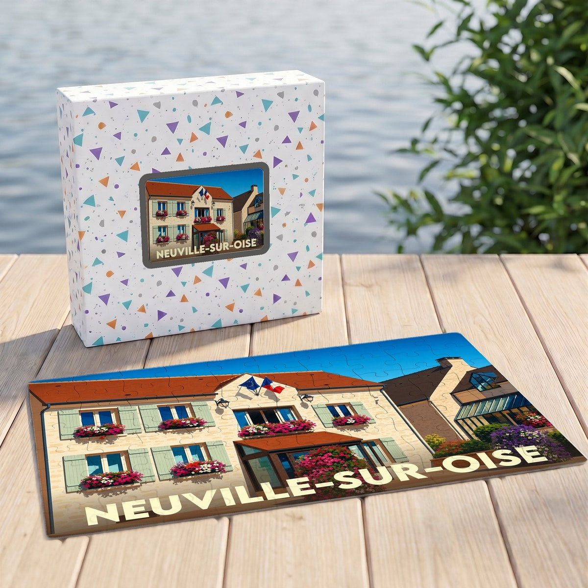 Puzzle souvenir de la ville de Neuville-sur-Oise avec son emballage illustré.