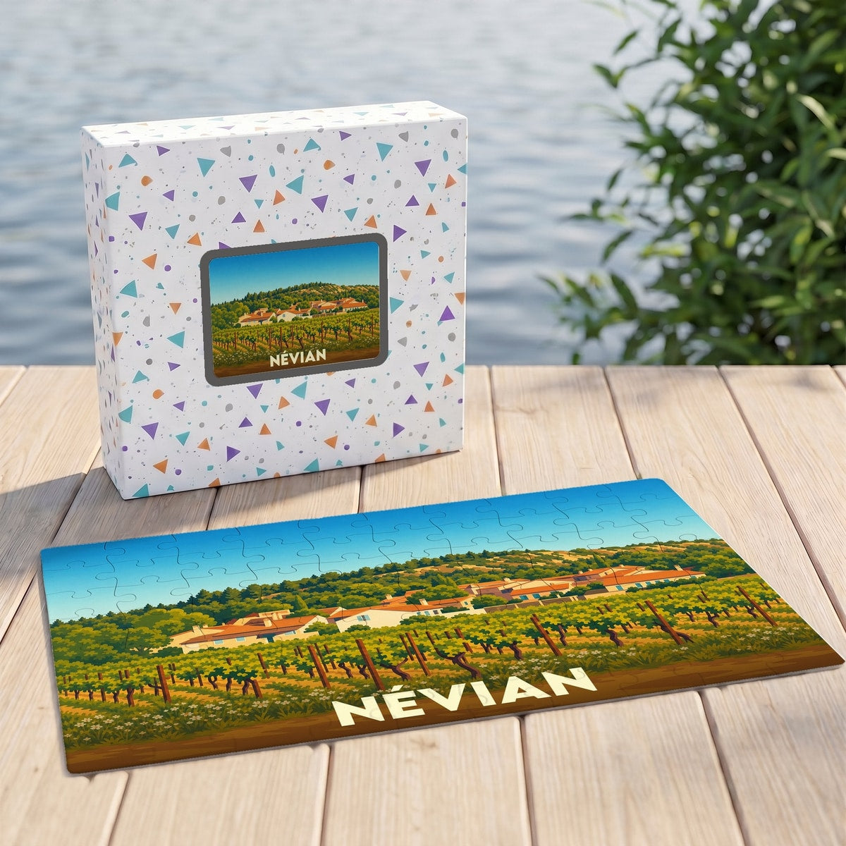 Puzzle souvenir de la ville de Névian avec une illustration stylisée d'un paysage de vignobles.