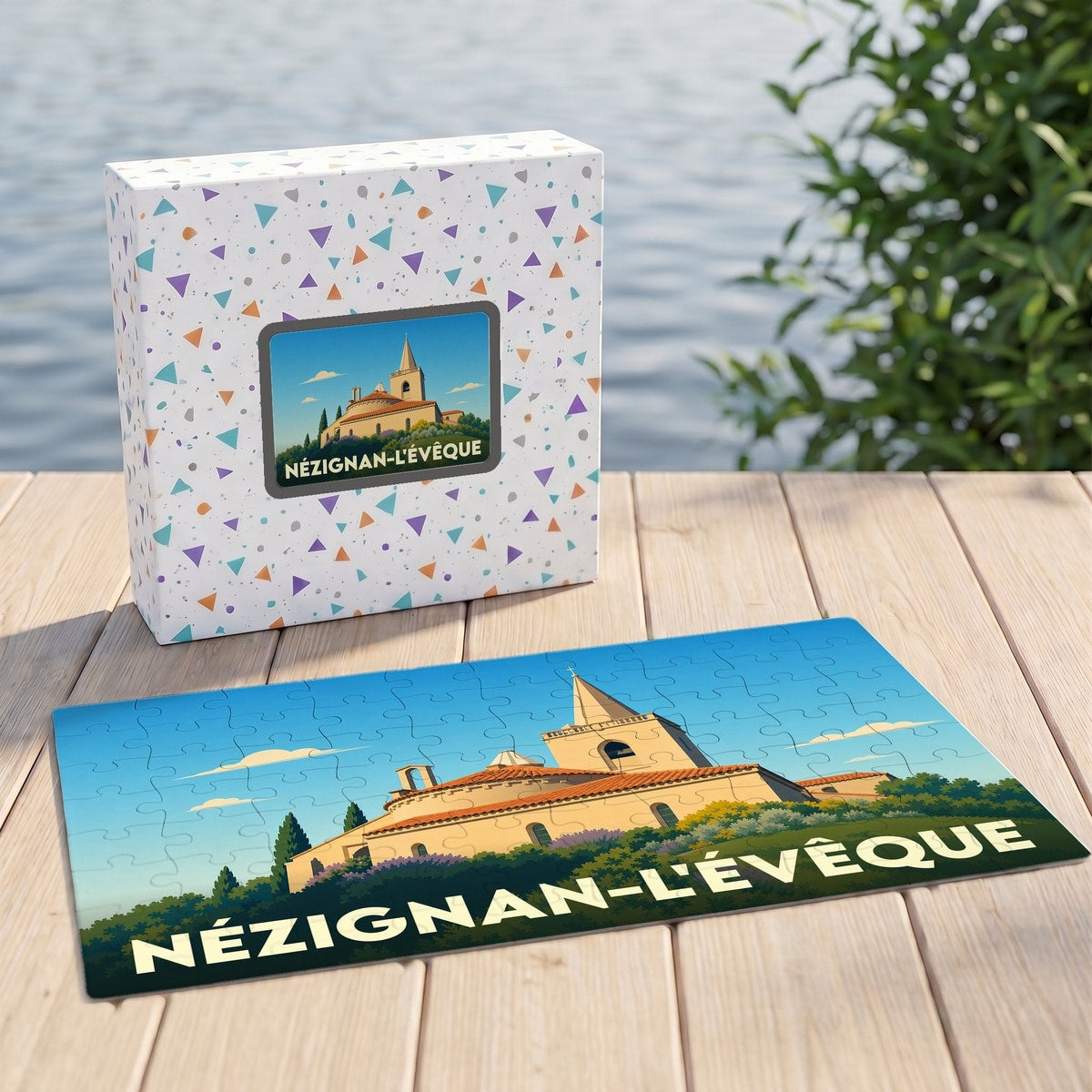 Puzzle souvenir de la ville de Nézignan-l'Évêque avec une illustration stylisée de son église.