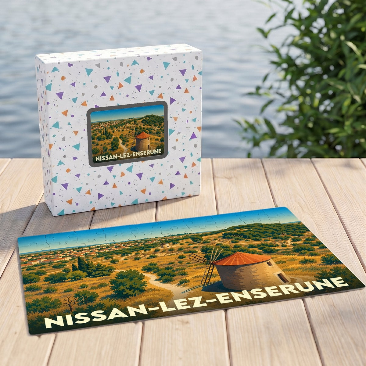 Puzzle souvenir de la ville de Nissan-lez-Enserune illustré par un paysage de moulin provençal.