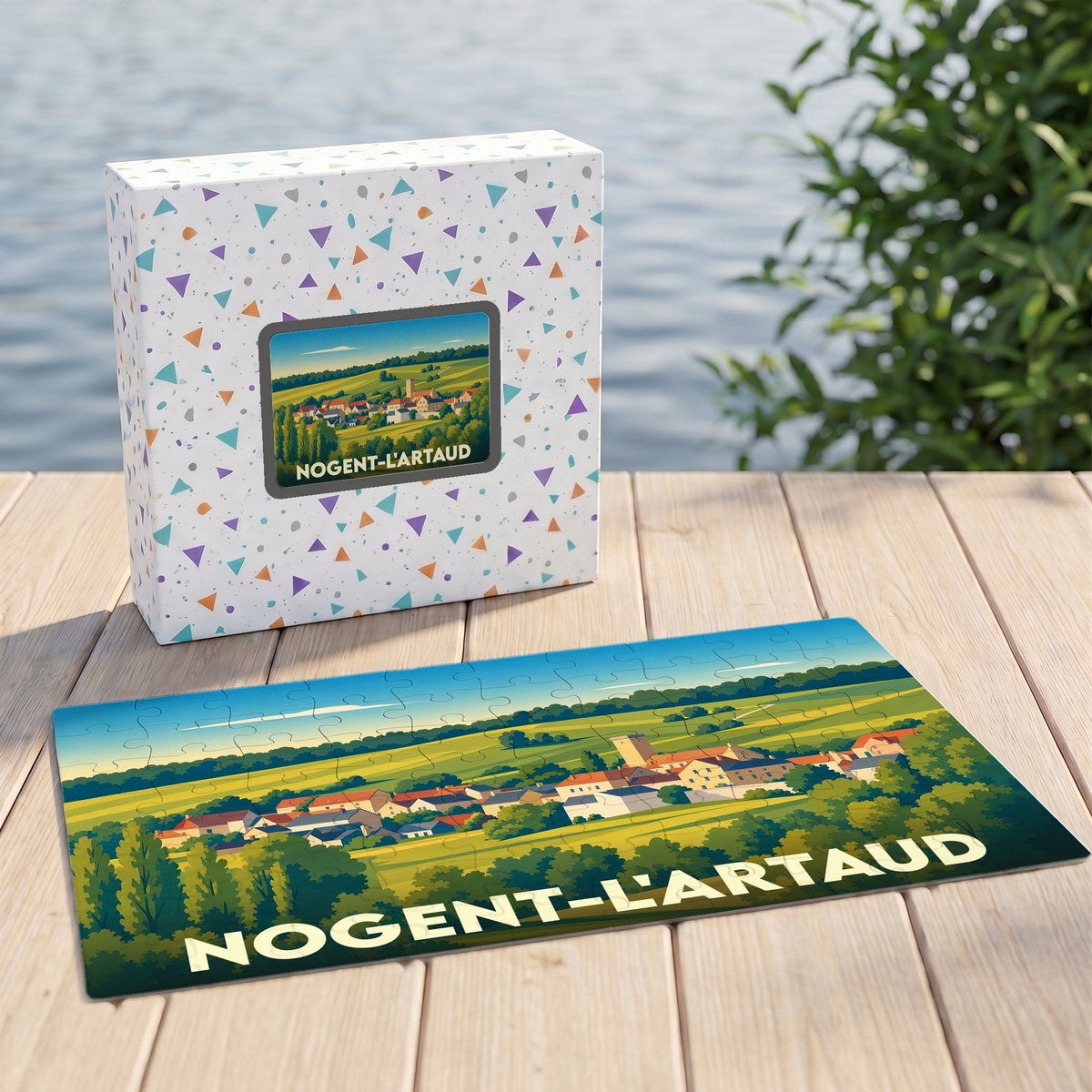 Puzzle souvenir de la ville de Nogent-l'Artaud avec une illustration paysagère stylisée.