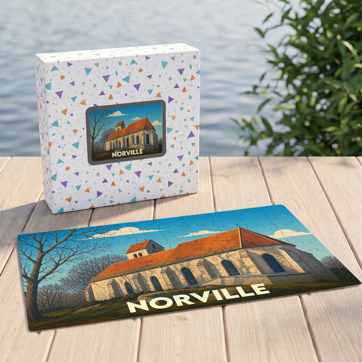 Puzzle souvenir de la ville de Norville illustré d'un monument historique avec sa boîte assortie.