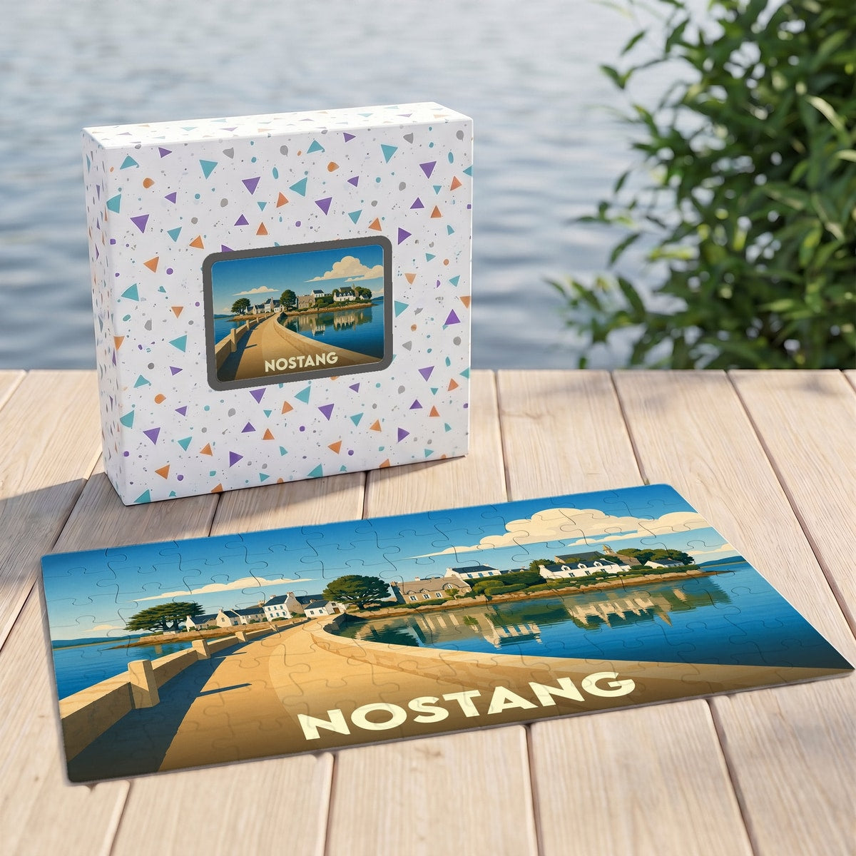 Puzzle souvenir de la ville de Nostang avec une illustration stylisée d'un paysage côtier.